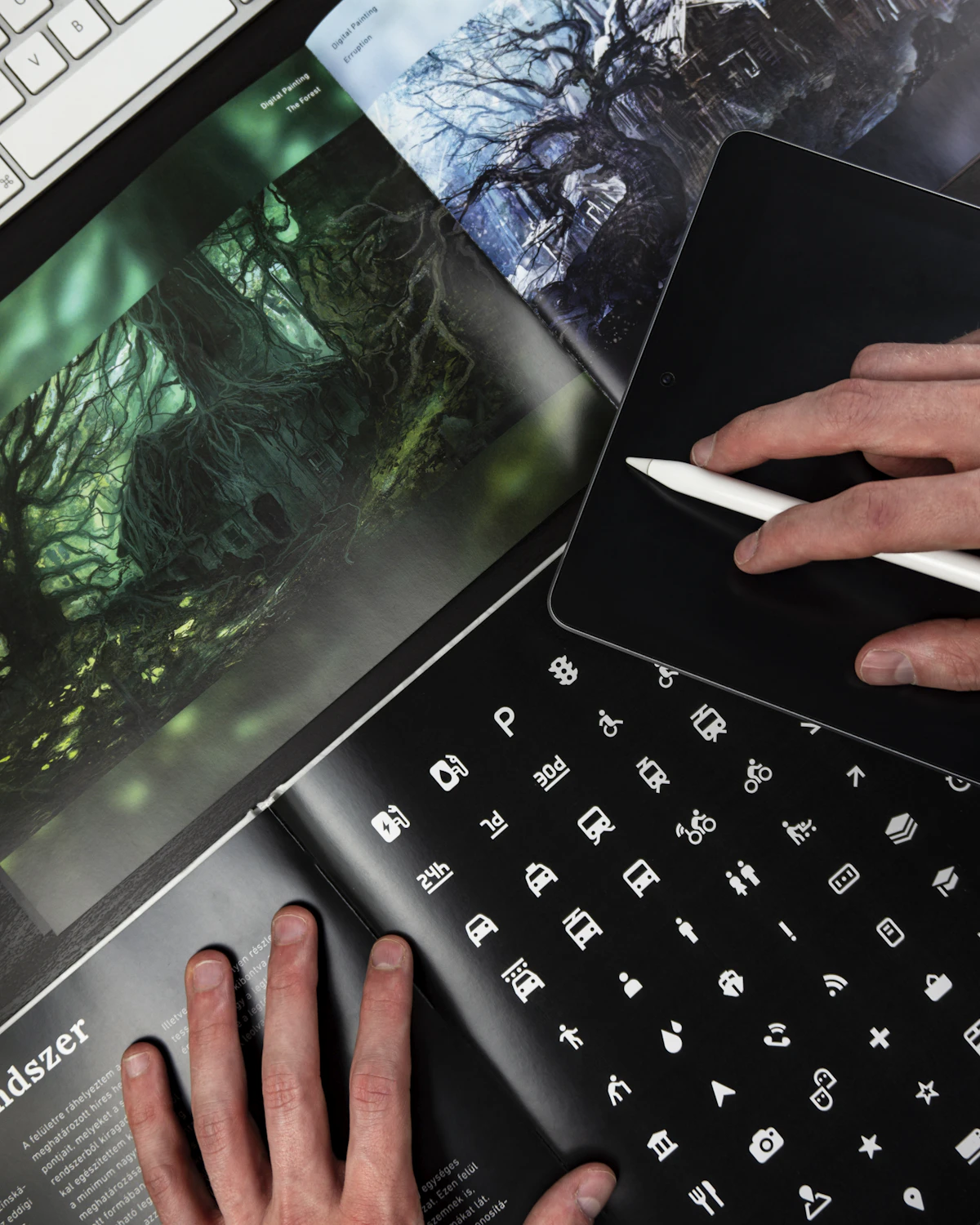 Designer workspace with sketches and interface mockups